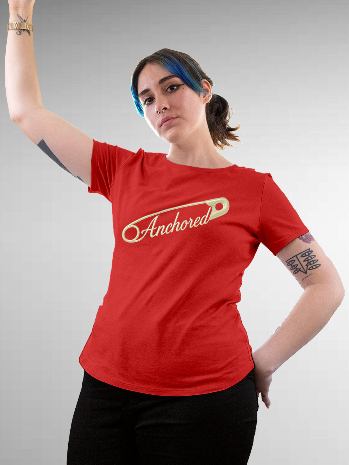 Model wearing Women's Red Round Neck T-shirt with 'Anchored' design, offering effortless style and premium comfort