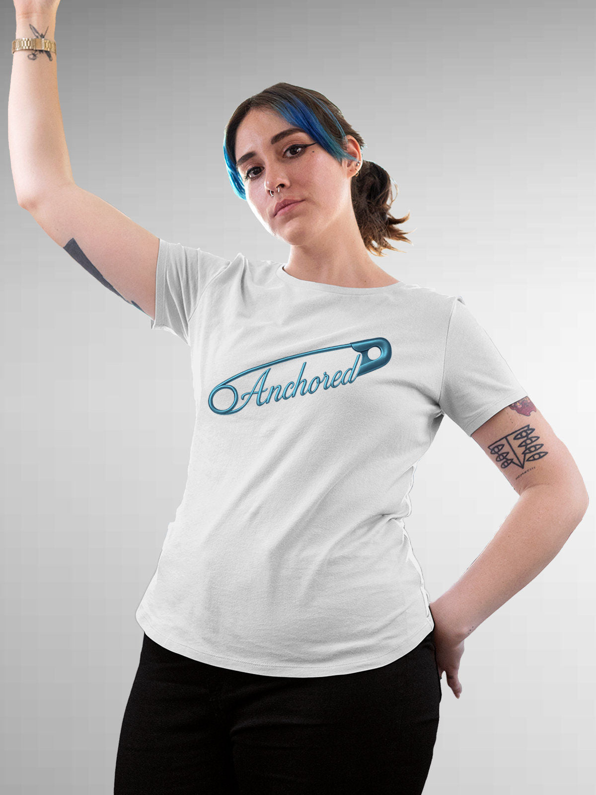 Model wearing Women's White Round Neck T-shirt with 'Anchored' design, offering effortless style and premium comfort