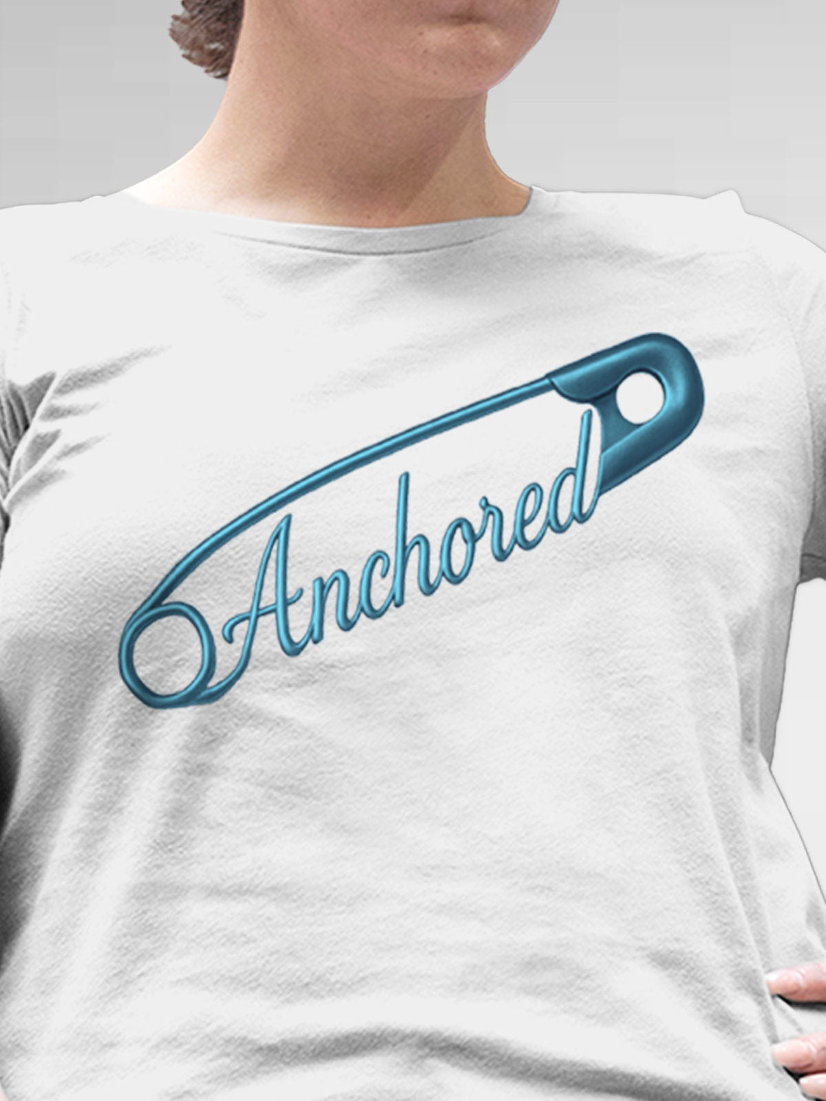 Close up of 'Anchored' design on Women's White Round Neck T-shirt, highlighting intricate details and vibrant print.