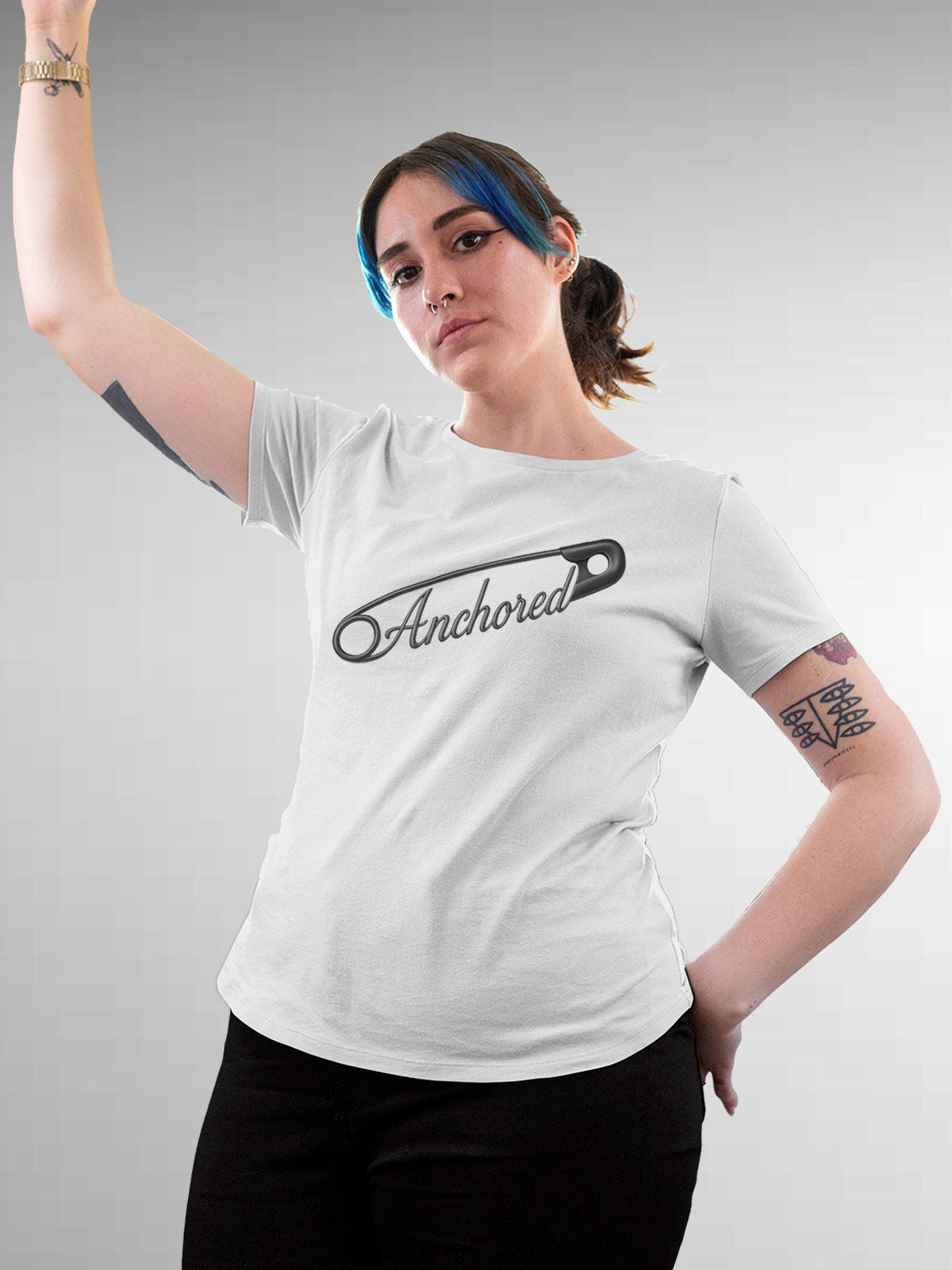 Model wearing Women's White Round Neck T-shirt with 'Anchored' design, offering effortless style and premium comfort