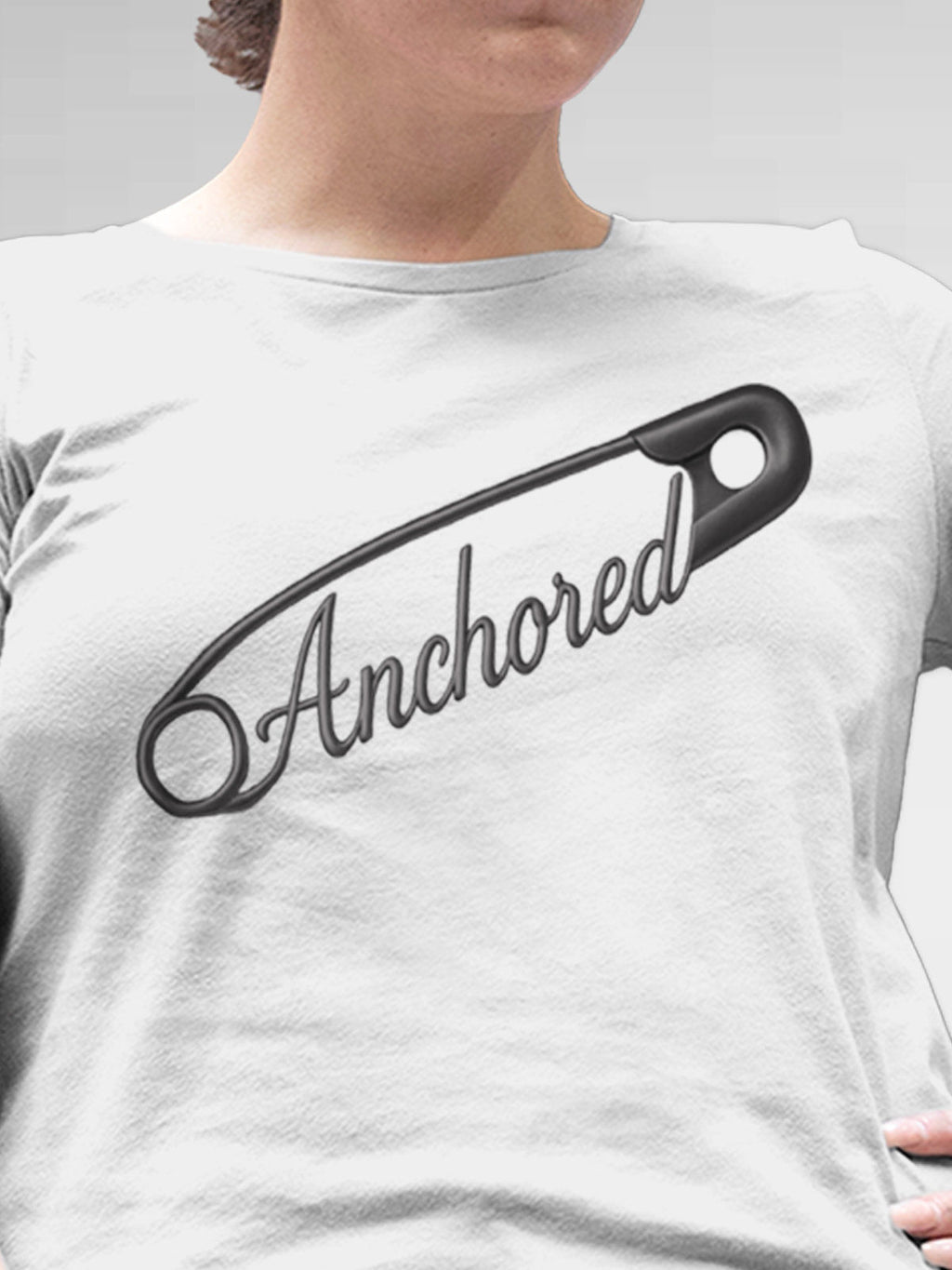 Close up of 'Anchored' design on Women's White Round Neck T-shirt, highlighting intricate details and vibrant print.