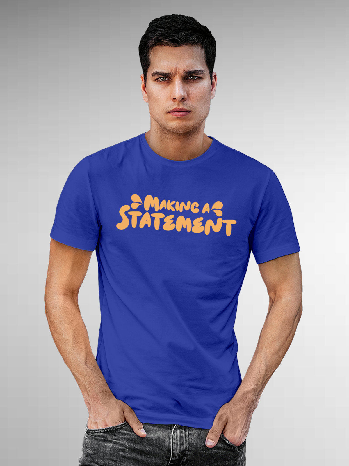 Model wearing Men's Blue Round Neck T-shirt with 'Making A Statement' design, offering effortless style and premium comfort