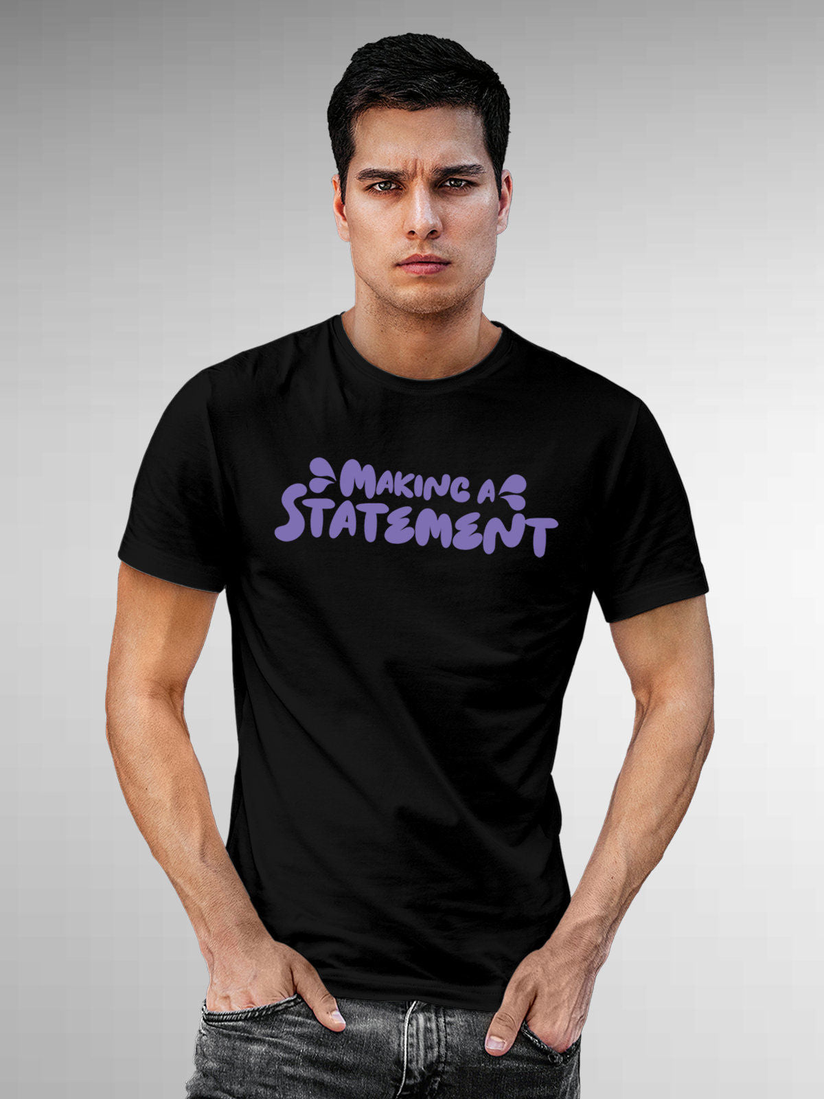 Model wearing Men's Black Round Neck T-shirt with 'Making A Statement' design, offering effortless style and premium comfort
