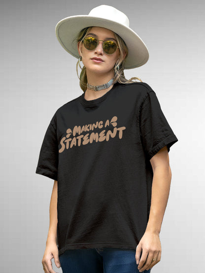 Model wearing Women's Dark Grey Round Neck T-shirt with 'Making A Statement' design, offering effortless style and premium comfort