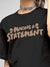 Close up of 'Making A Statement' design on Women's Dark Grey Round Neck T-shirt, highlighting intricate details and vibrant print.
