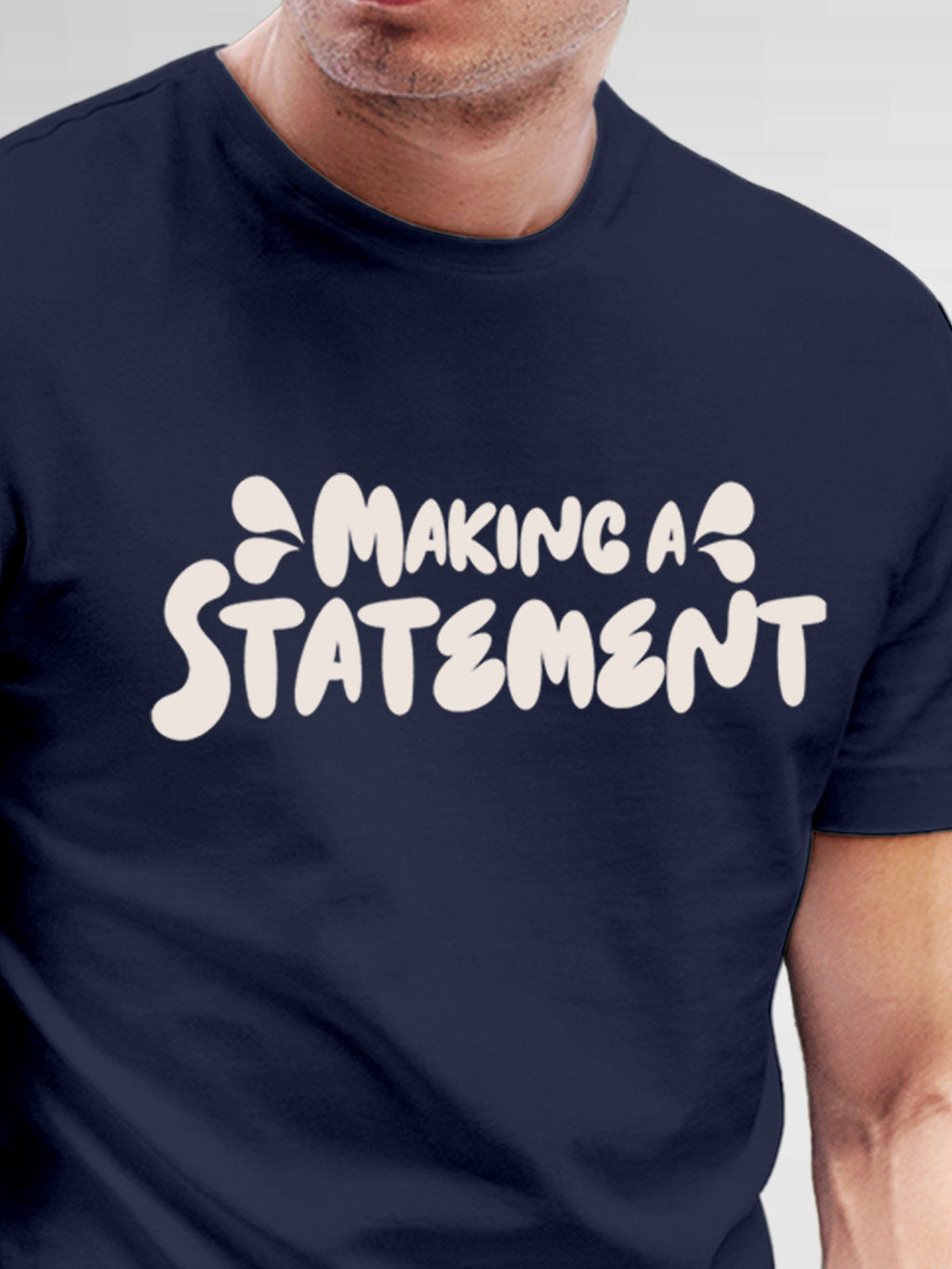 Close up of 'Making A Statement' design on Men's Navy Blue Round Neck T-shirt, highlighting intricate details and vibrant print.