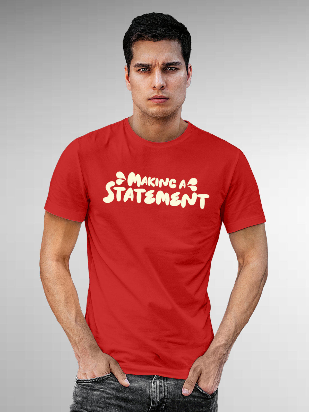 Model wearing Men's Red Round Neck T-shirt with 'Making A Statement' design, offering effortless style and premium comfort