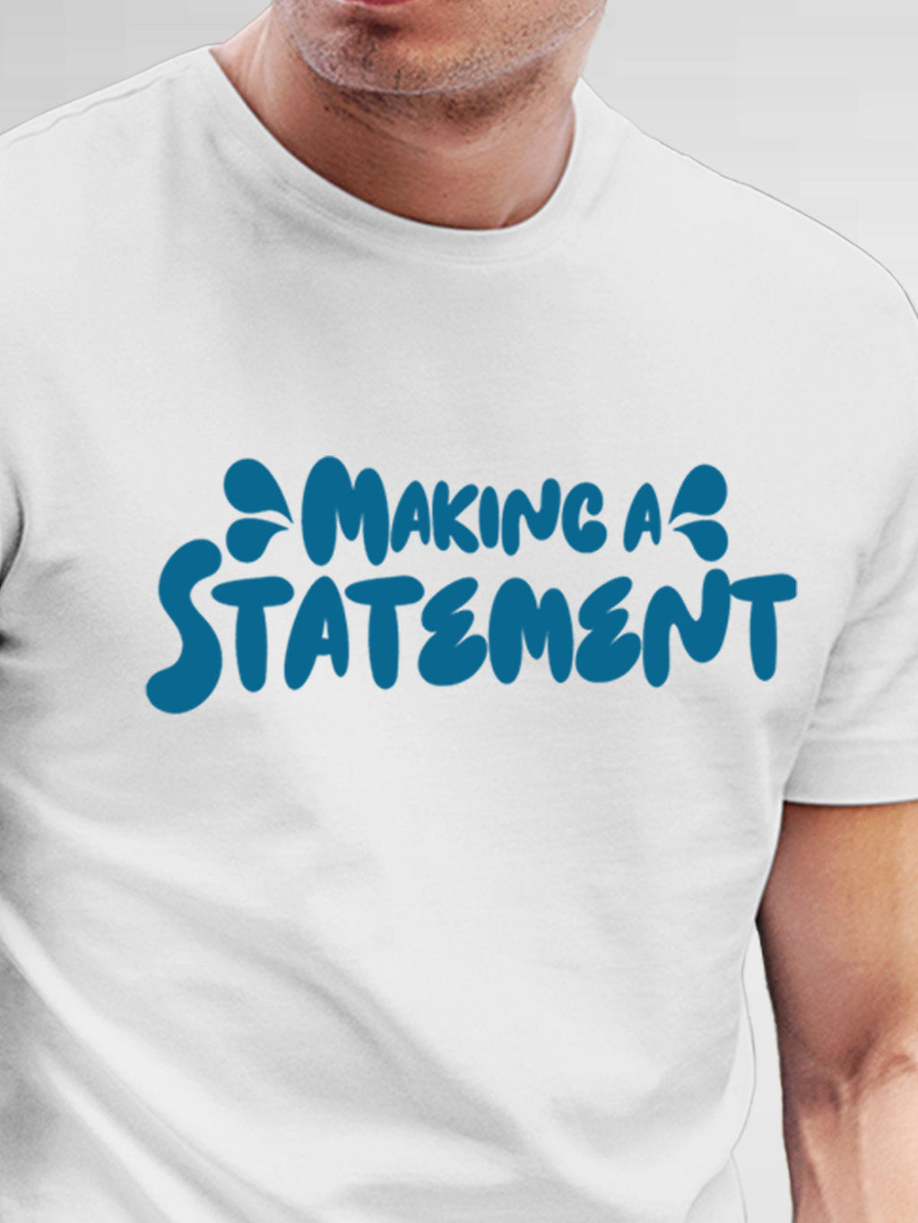 Close up of 'Making A Statement' design on Men's White Round Neck T-shirt, highlighting intricate details and vibrant print.