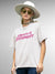Model wearing Women's White Round Neck T-shirt with 'Making A Statement' design, offering effortless style and premium comfort