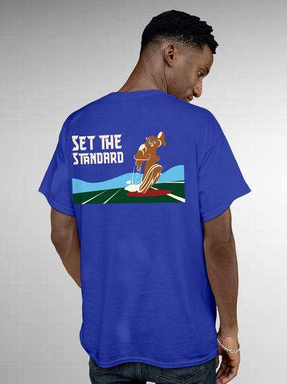 Model wearing Men's Blue Round Neck T-shirt with 'Set The Standard' design, offering effortless style and premium comfort