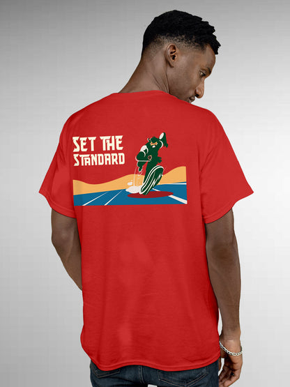 Model wearing Men's Red Round Neck T-shirt with 'Set The Standard' design, offering effortless style and premium comfort