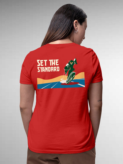 Model wearing Women's Red Round Neck T-shirt with 'Set The Standard' design, offering effortless style and premium comfort