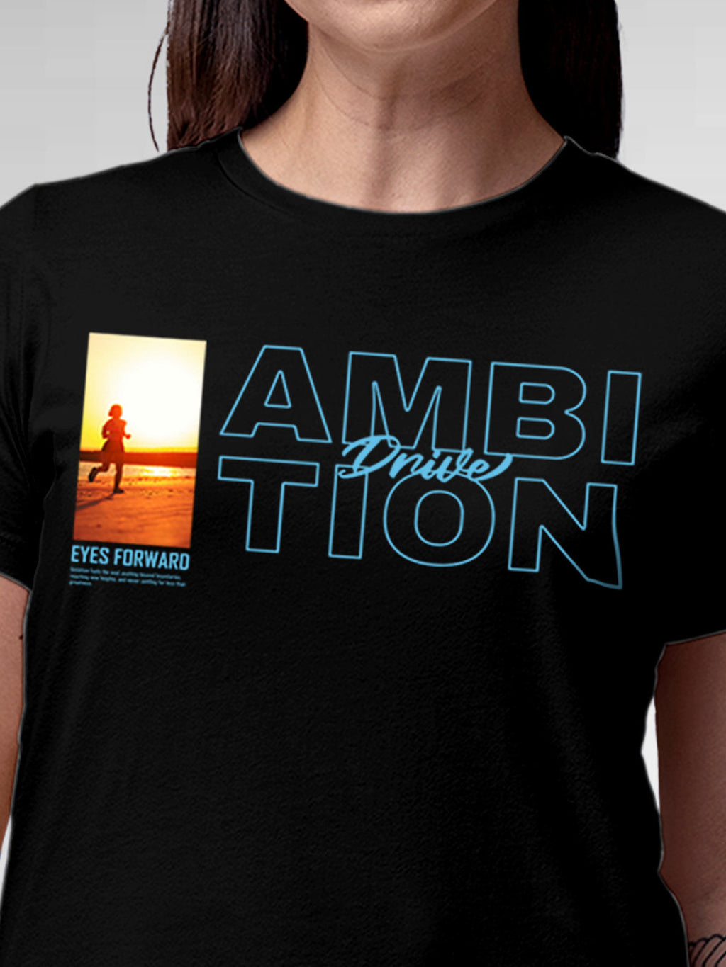 Close up of 'Ambition & Drive' design on Women's Black Round Neck T-shirt, highlighting intricate details and vibrant print.