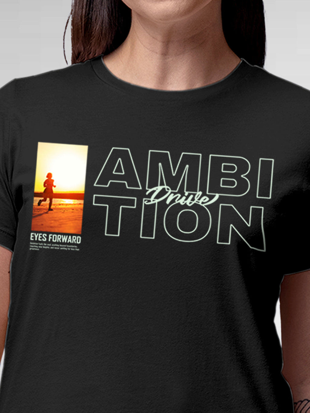 Close up of 'Ambition & Drive' design on Women's Dark Grey Round Neck T-shirt, highlighting intricate details and vibrant print.