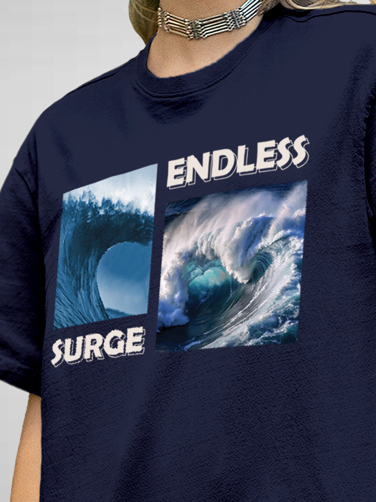 Close up of 'Endless Surge' design on Women's Navy Blue Round Neck T-shirt, highlighting intricate details and vibrant print.