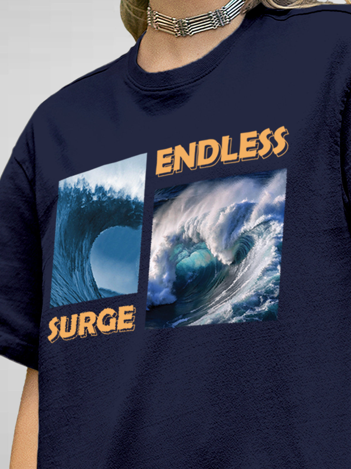 Close up of 'Endless Surge' design on Women's Navy Blue Round Neck T-shirt, highlighting intricate details and vibrant print.