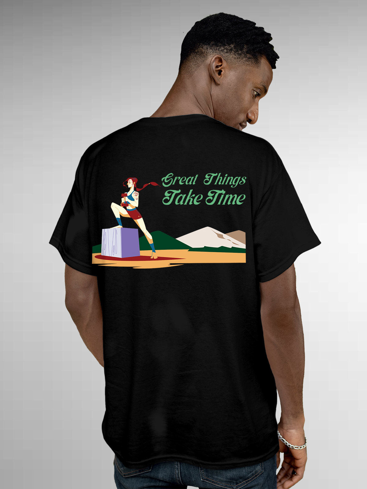Model wearing Men's Black Round Neck T-shirt with 'Great Things Take Time' design, offering effortless style and premium comfort
