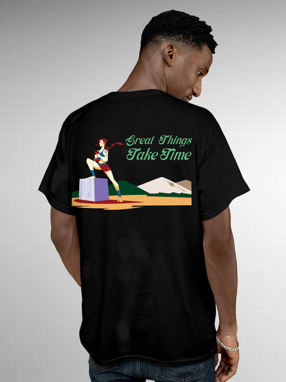Model wearing Men's Black Round Neck T-shirt with 'Great Things Take Time' design, offering effortless style and premium comfort