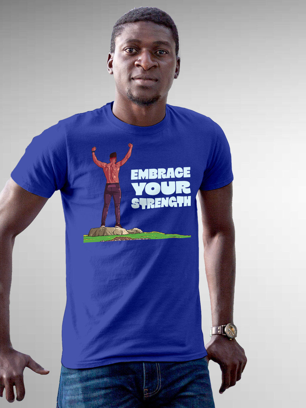 Model wearing Men's Blue Round Neck T-shirt with 'Embrace Your Strength' design, offering effortless style and premium comfort