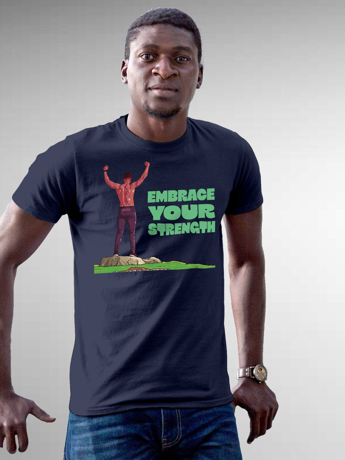 Model wearing Men's Navy Blue Round Neck T-shirt with 'Embrace Your Strength' design, offering effortless style and premium comfort