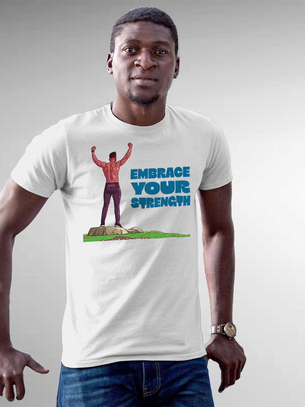 Model wearing Men's White Round Neck T-shirt with 'Embrace Your Strength' design, offering effortless style and premium comfort