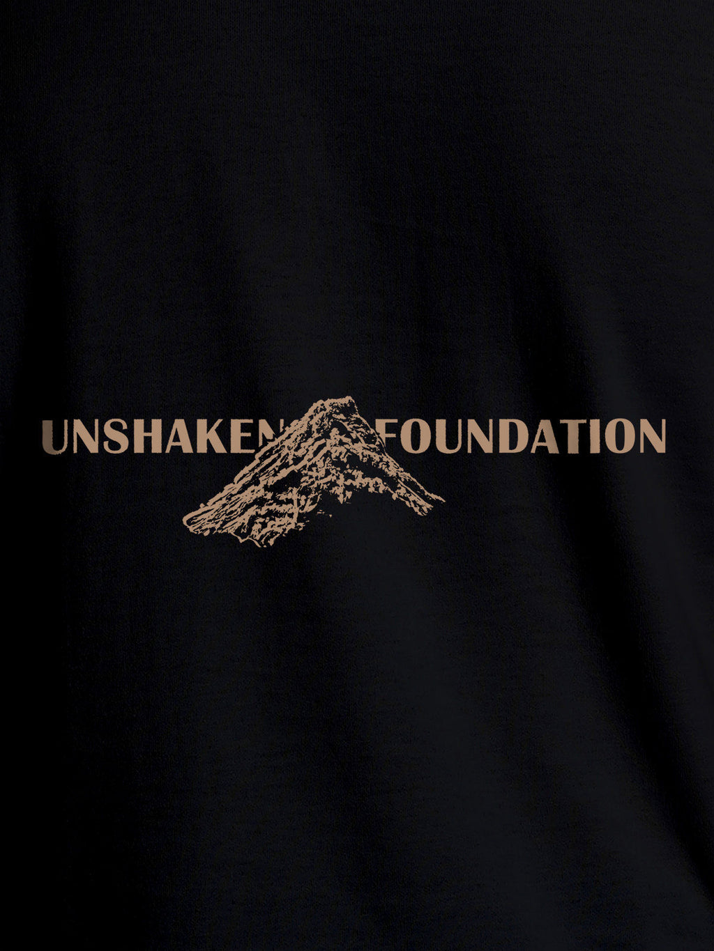 Close up of 'Unshaken Foundation' design on Men's Black Round Neck T-shirt, highlighting intricate details and vibrant print.