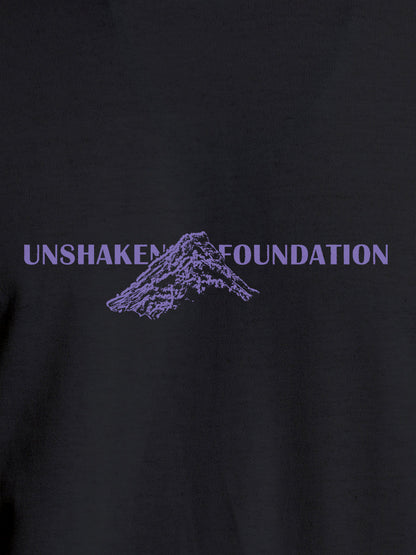 Close up of 'Unshaken Foundation' design on Women's Dark Grey Round Neck T-shirt, highlighting intricate details and vibrant print.