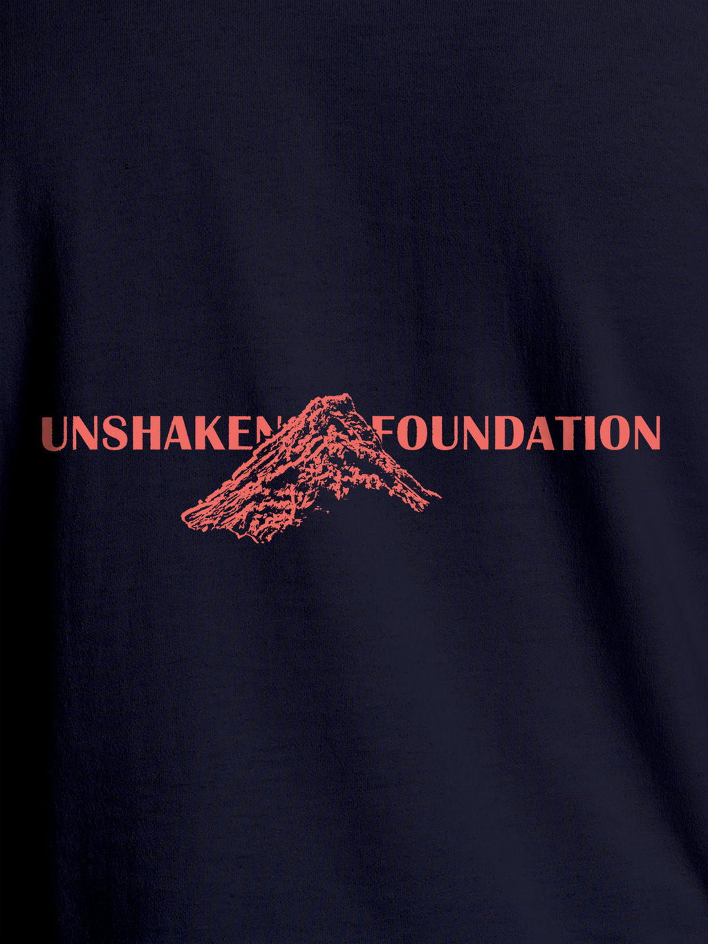 Close up of 'Unshaken Foundation' design on Men's Navy Blue Round Neck T-shirt, highlighting intricate details and vibrant print.