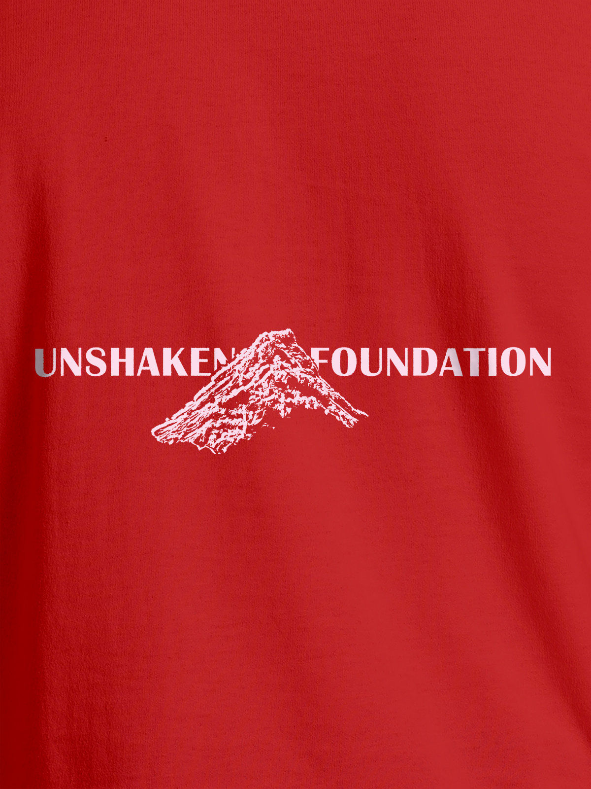 Close up of 'Unshaken Foundation' design on Men's Red Round Neck T-shirt, highlighting intricate details and vibrant print.