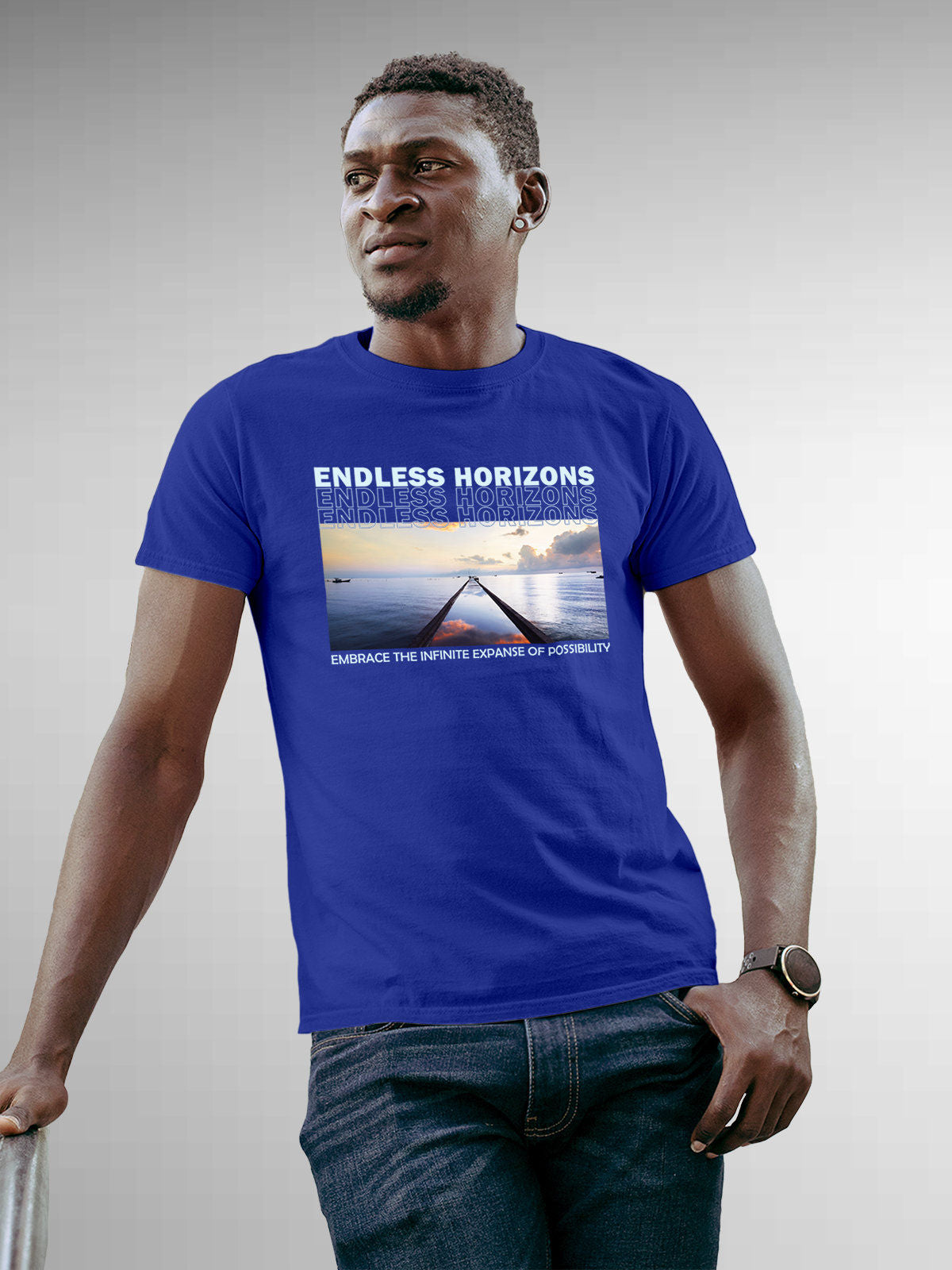 Model wearing Men's Blue Round Neck T-shirt with 'Endless Horizons' design, offering effortless style and premium comfort