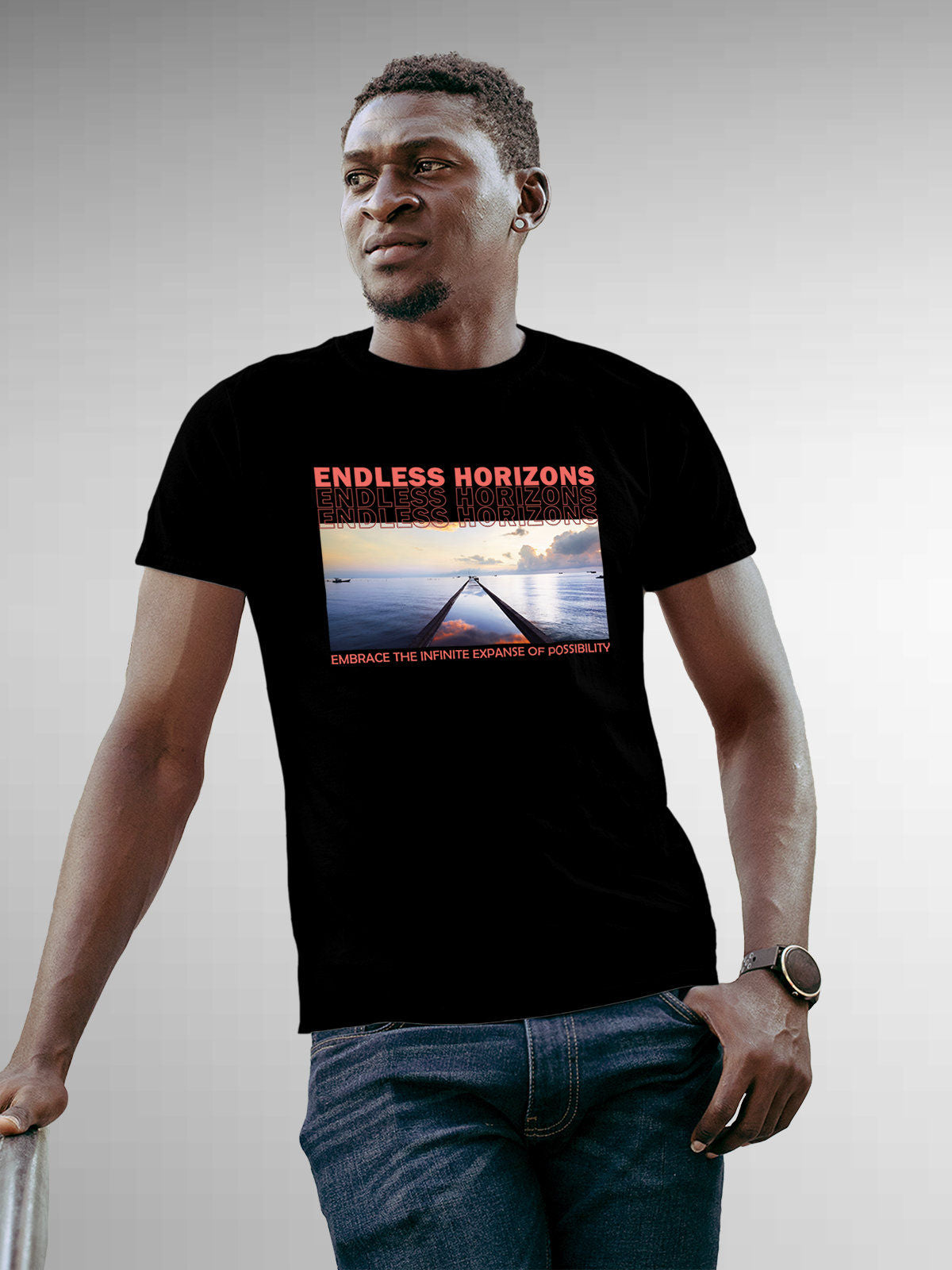 Model wearing Men's Black Round Neck T-shirt with 'Endless Horizons' design, offering effortless style and premium comfort