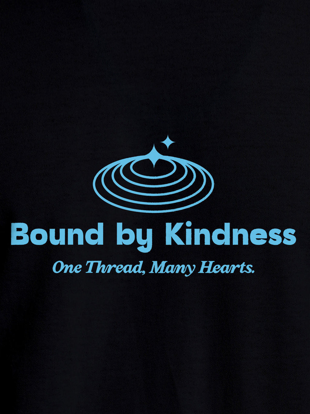 Close up of 'Bound By Kindness' design on Women's Black Round Neck T-shirt, highlighting intricate details and vibrant print.