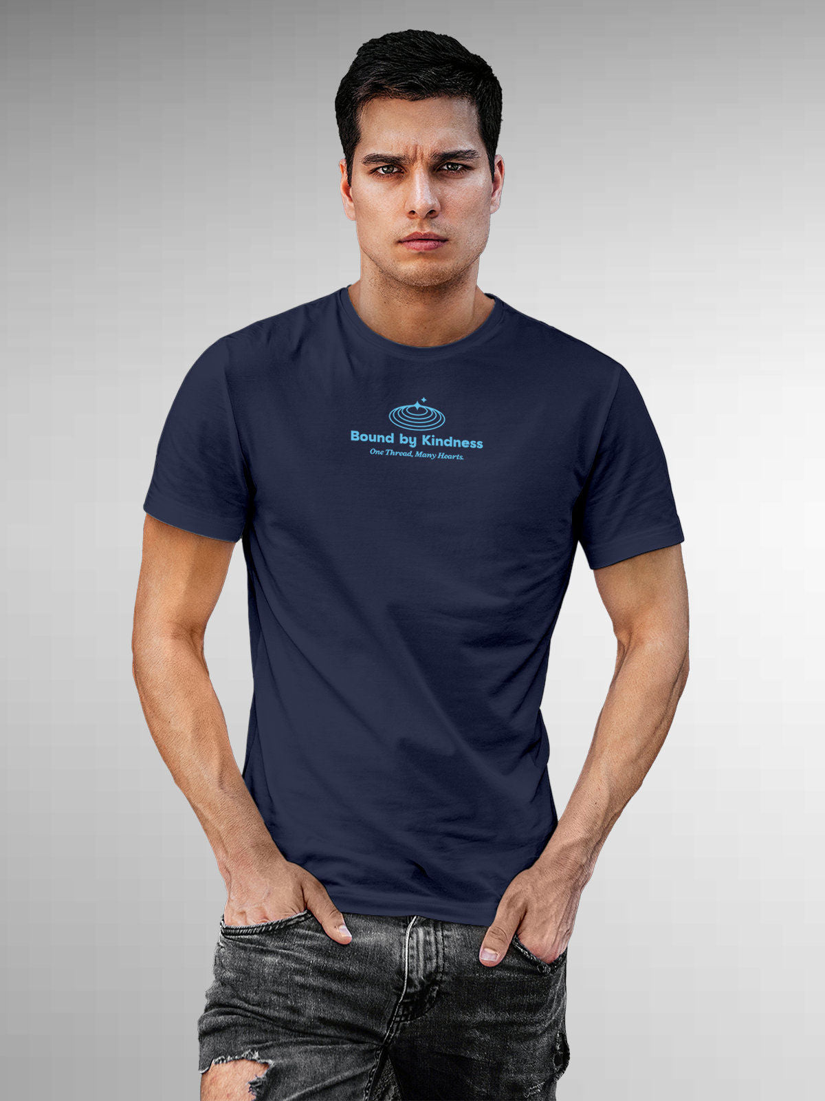 Model wearing Men's Navy Blue Round Neck T-shirt with 'Bound By Kindness' design, offering effortless style and premium comfort