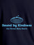 Close up of 'Bound By Kindness' design on Men's Navy Blue Round Neck T-shirt, highlighting intricate details and vibrant print.