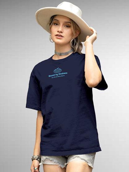 Model wearing Women's Navy Blue Round Neck T-shirt with 'Bound By Kindness' design, offering effortless style and premium comfort
