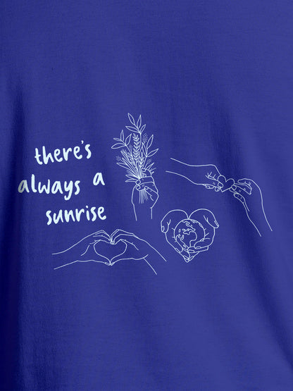Close up of 'There's Always a Sunrise' design on Women's Blue Round Neck T-shirt, highlighting intricate details and vibrant print.