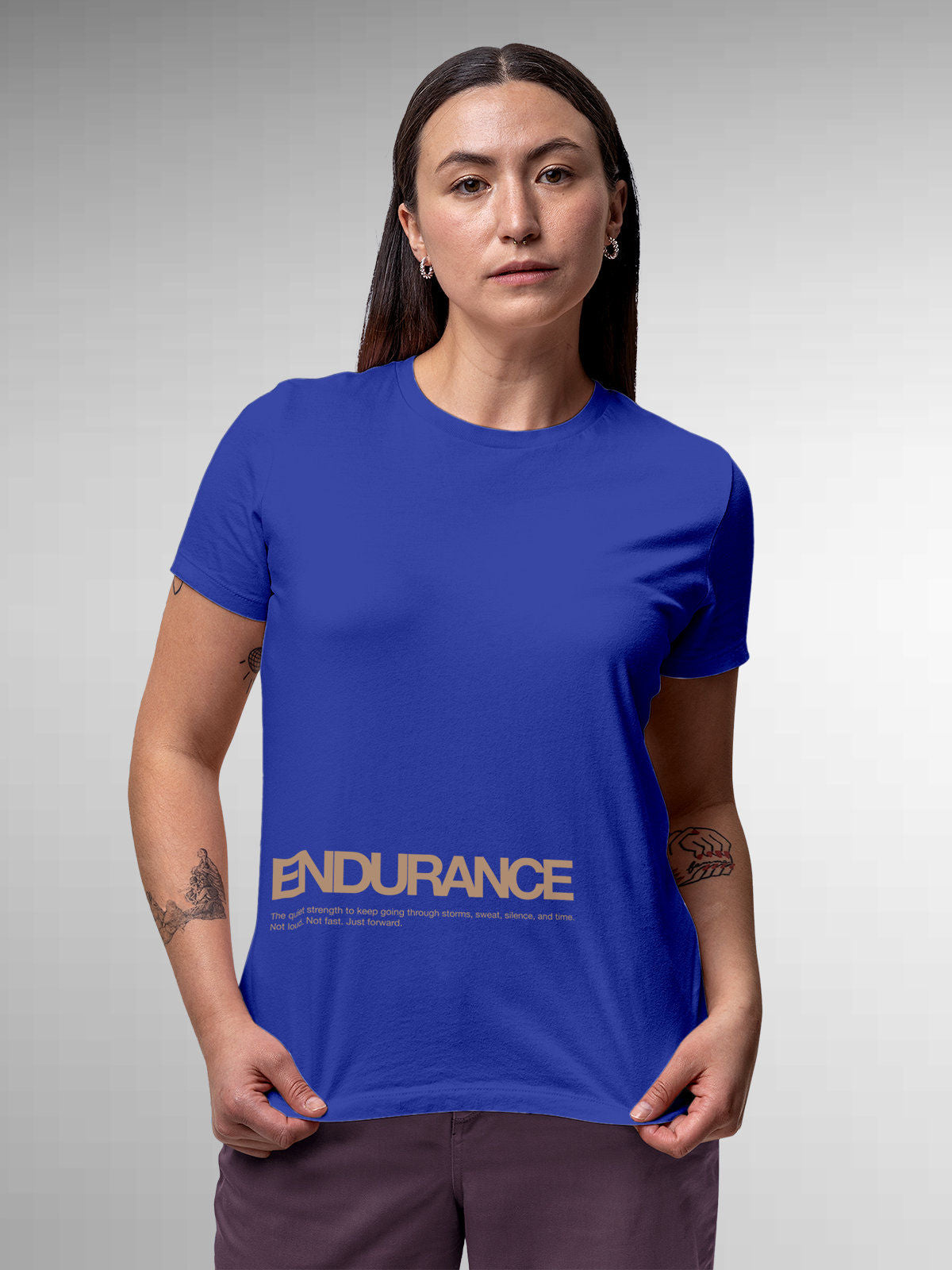 Model wearing Women's Blue Round Neck T-shirt with 'Endurance' design, offering effortless style and premium comfort