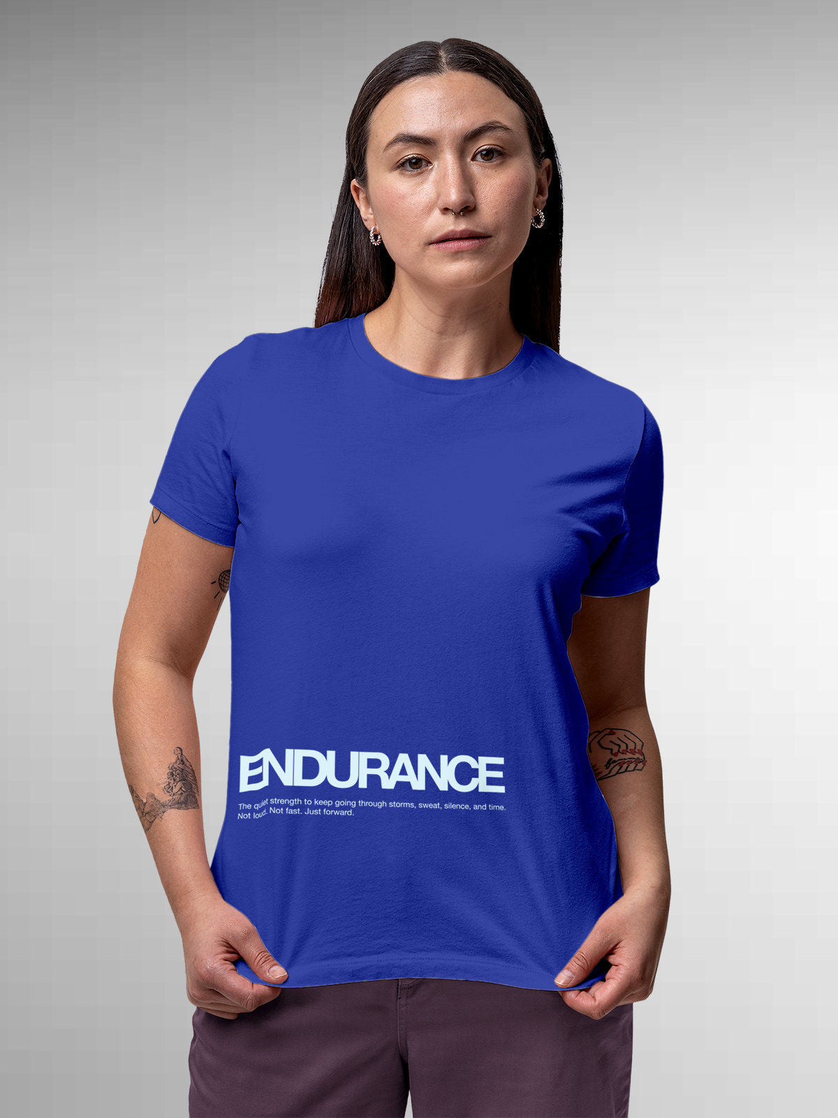 Model wearing Women's Blue Round Neck T-shirt with 'Endurance' design, offering effortless style and premium comfort
