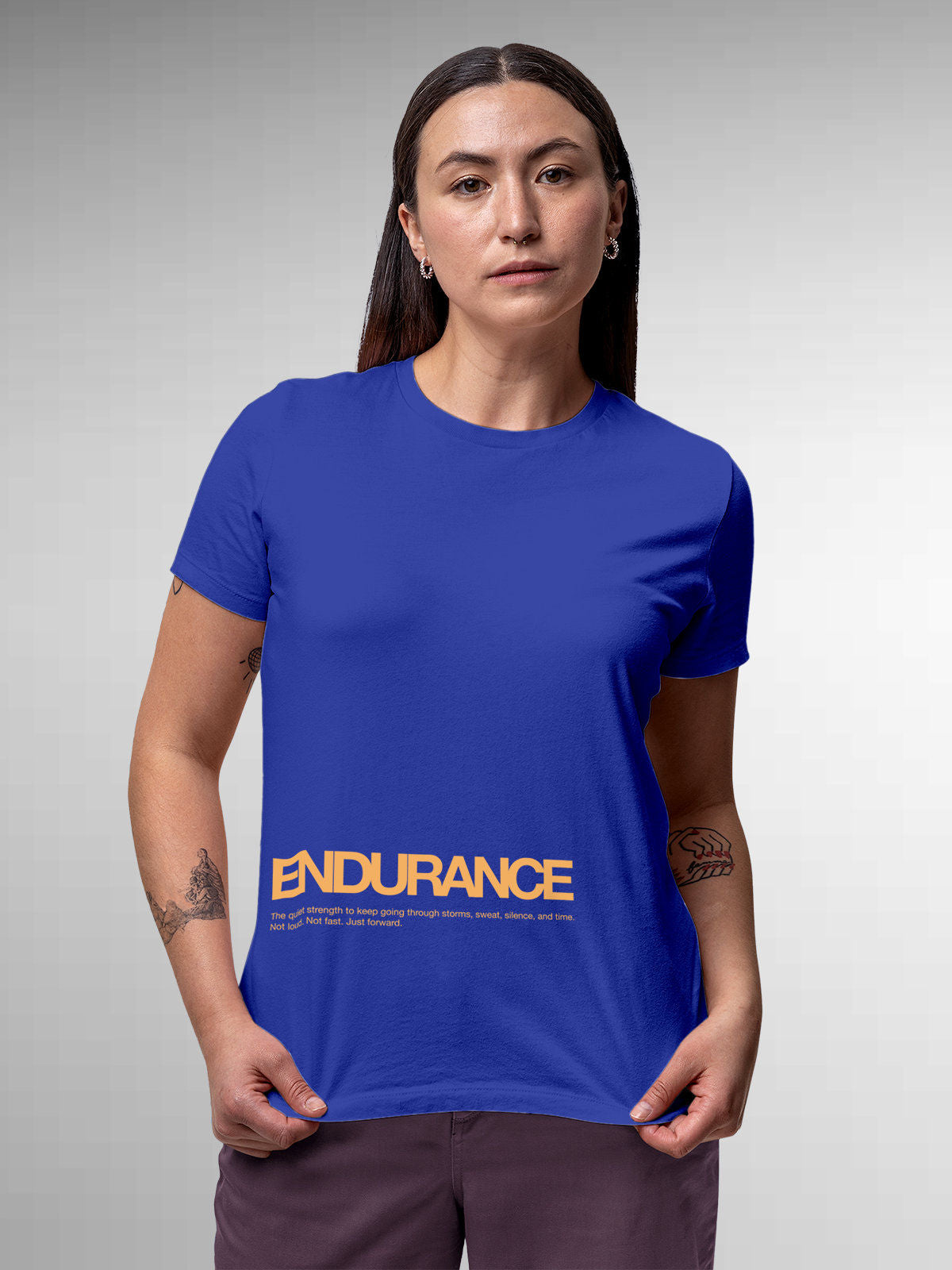 Model wearing Women's Blue Round Neck T-shirt with 'Endurance' design, offering effortless style and premium comfort