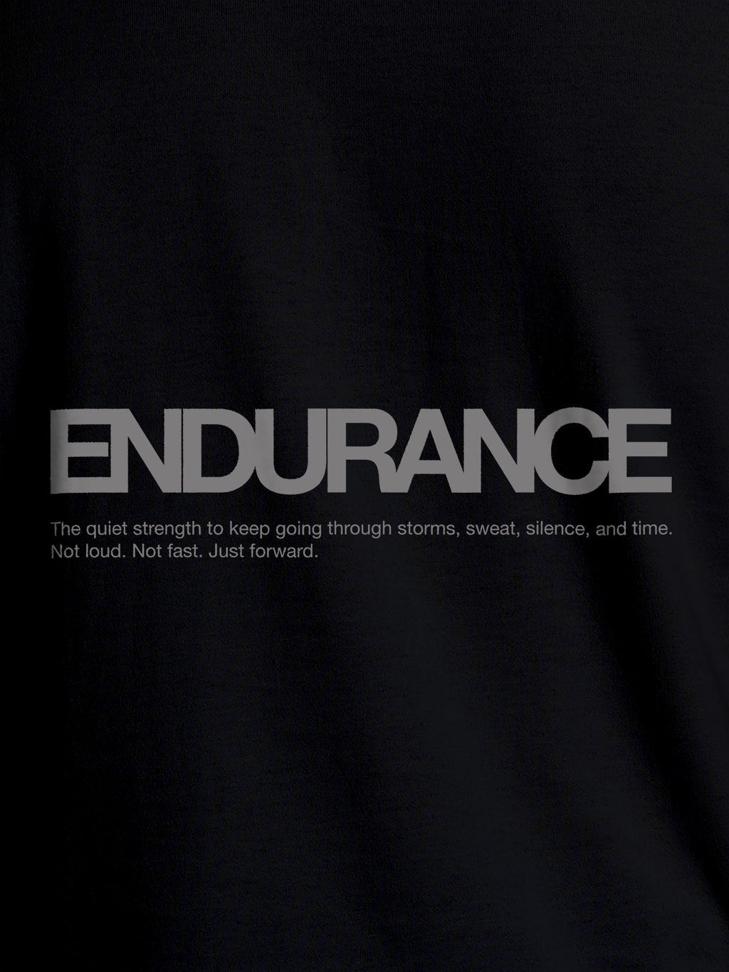 Close up of 'Endurance' design on Men's Black Round Neck T-shirt, highlighting intricate details and vibrant print.