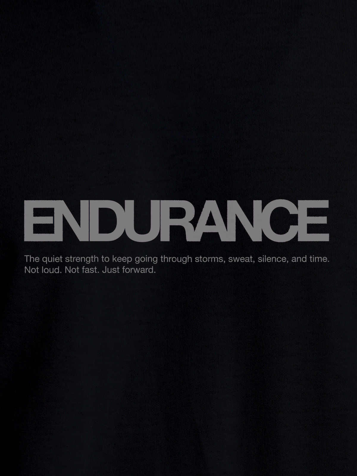 Close up of 'Endurance' design on Women's Black Round Neck T-shirt, highlighting intricate details and vibrant print.