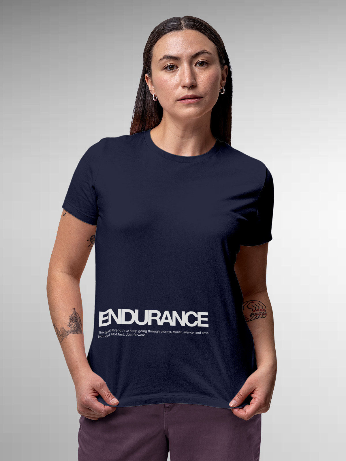 Model wearing Women's Navy Blue Round Neck T-shirt with 'Endurance' design, offering effortless style and premium comfort