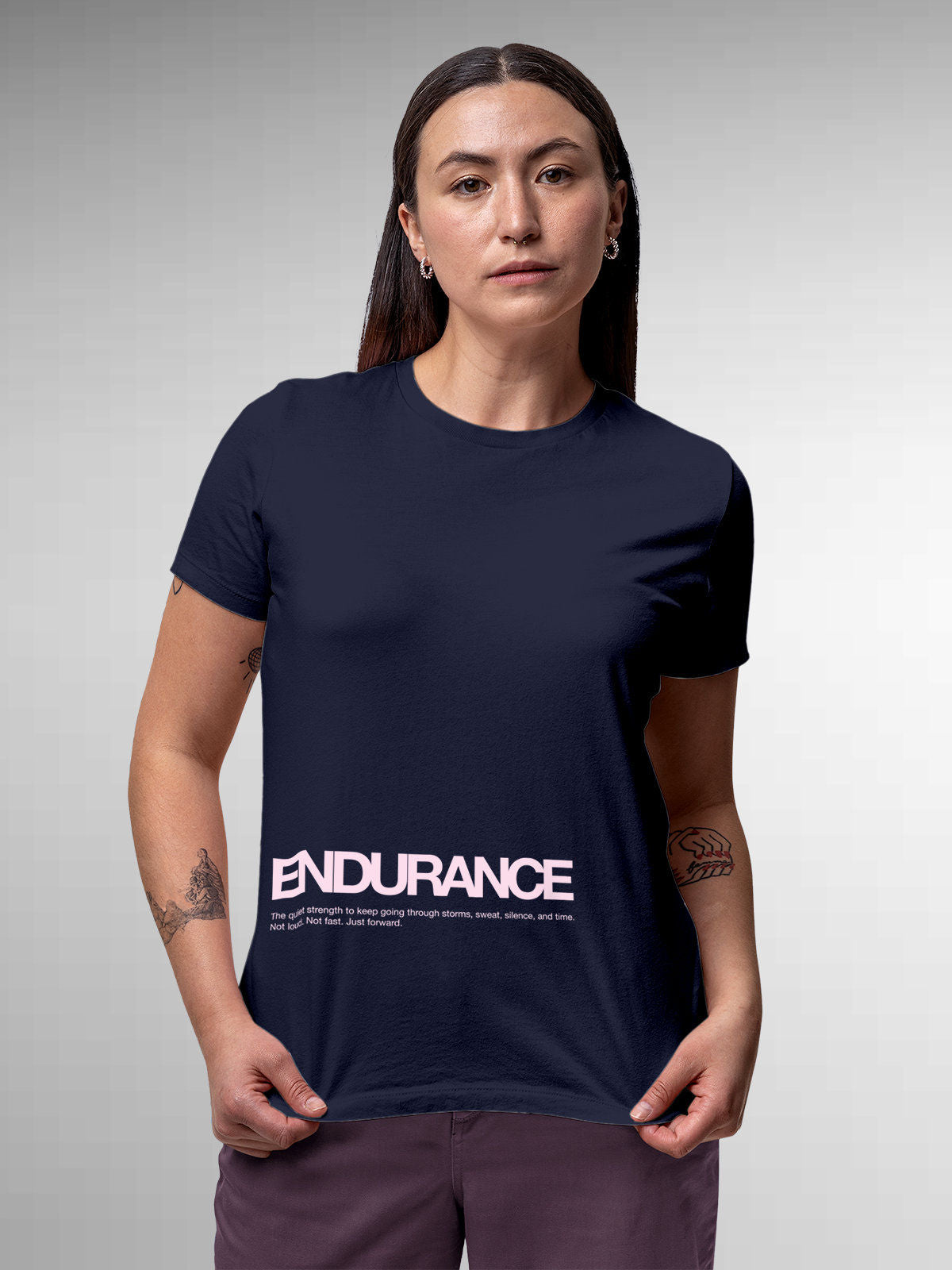Model wearing Women's Navy Blue Round Neck T-shirt with 'Endurance' design, offering effortless style and premium comfort