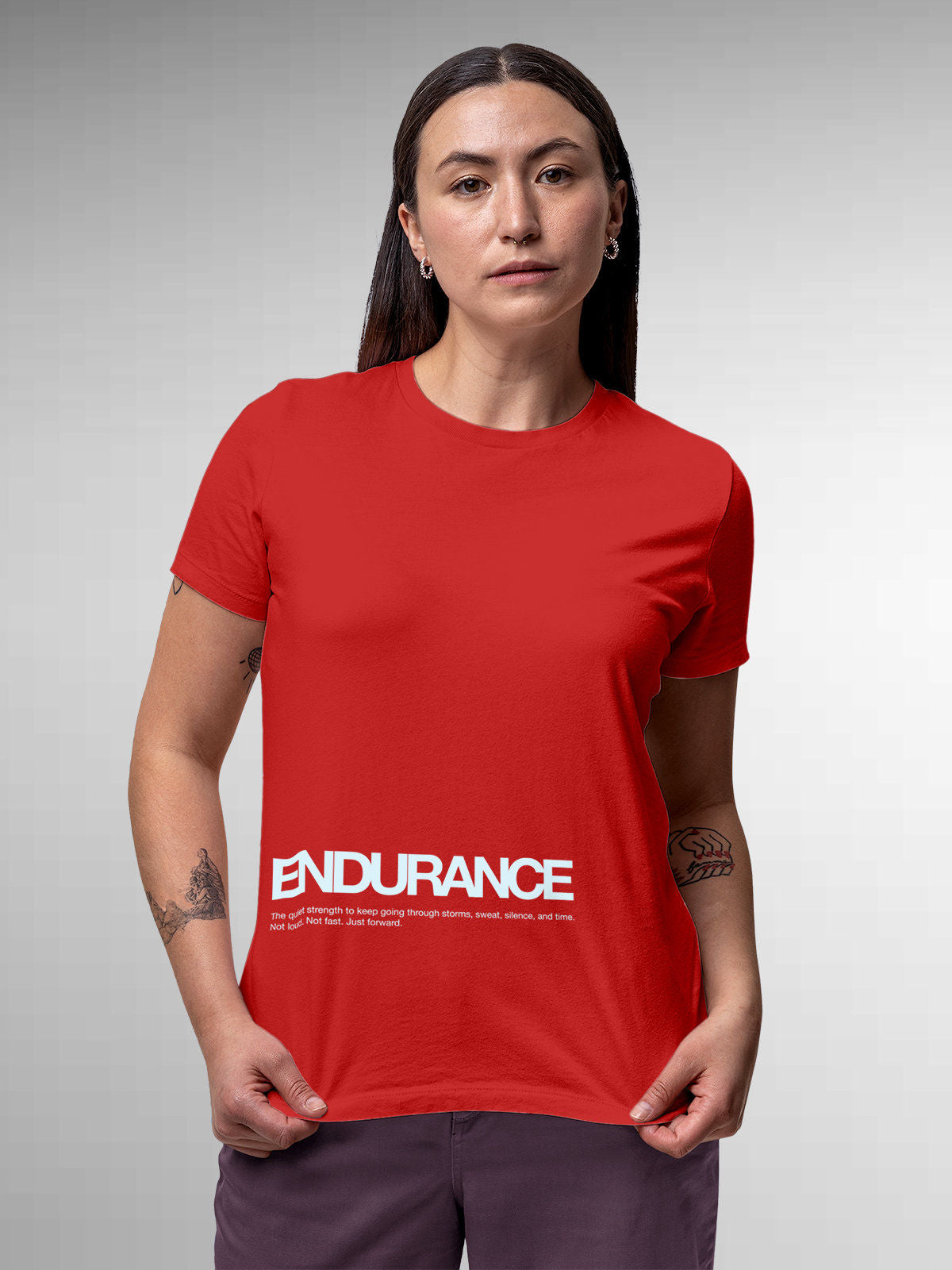 Model wearing Women's Red Round Neck T-shirt with 'Endurance' design, offering effortless style and premium comfort