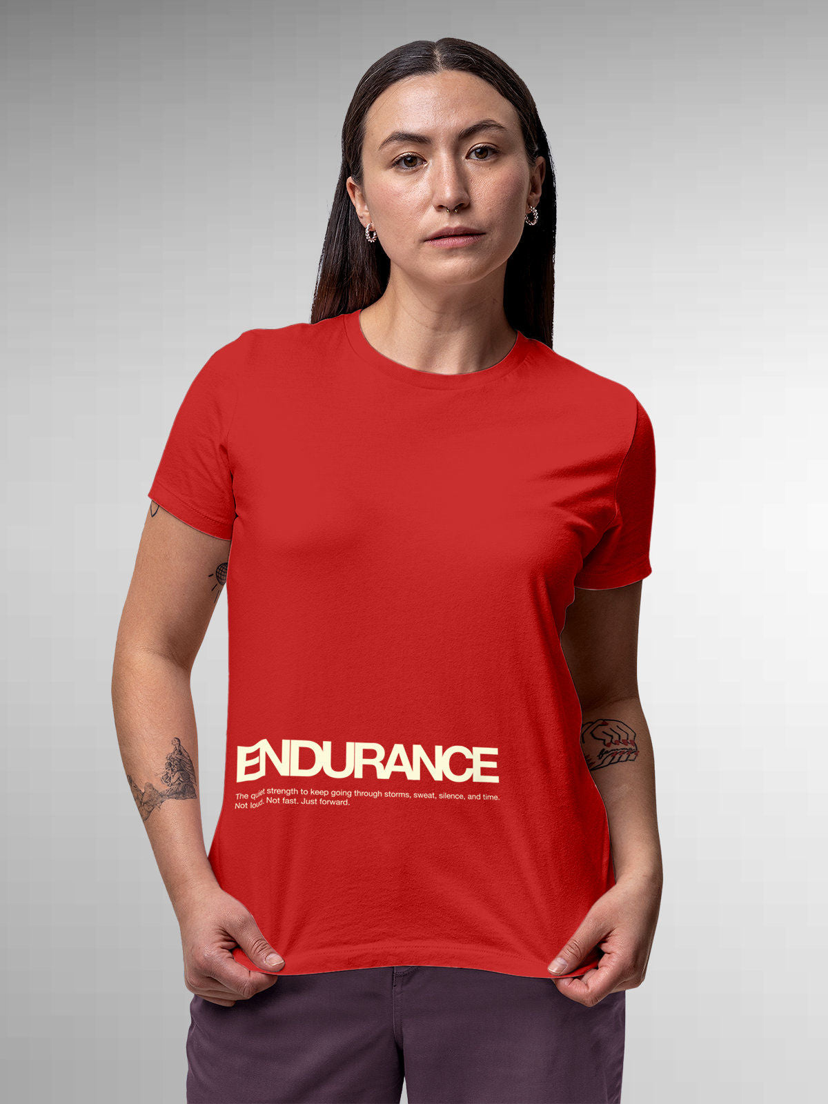 Model wearing Women's Red Round Neck T-shirt with 'Endurance' design, offering effortless style and premium comfort