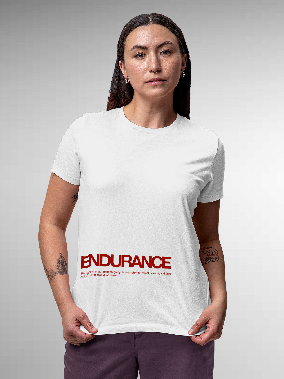 Model wearing Women's White Round Neck T-shirt with 'Endurance' design, offering effortless style and premium comfort