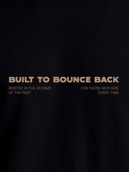 Close up of 'Built To Bounce Back' design on Men's Black Round Neck T-shirt, highlighting intricate details and vibrant print.