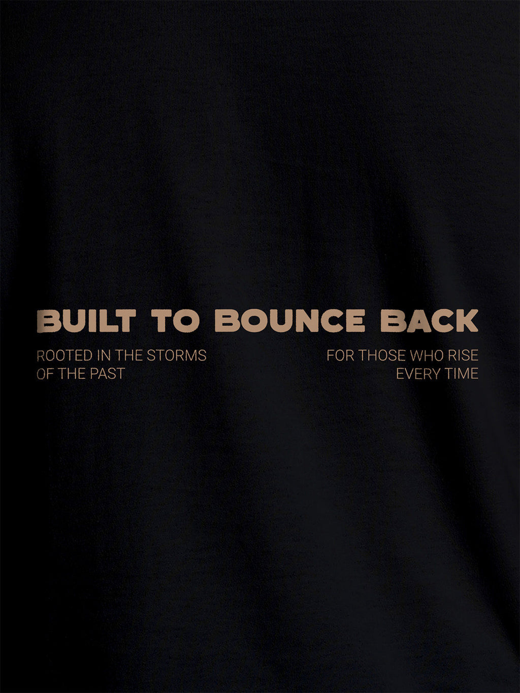 Close up of 'Built To Bounce Back' design on Women's Black Round Neck T-shirt, highlighting intricate details and vibrant print.