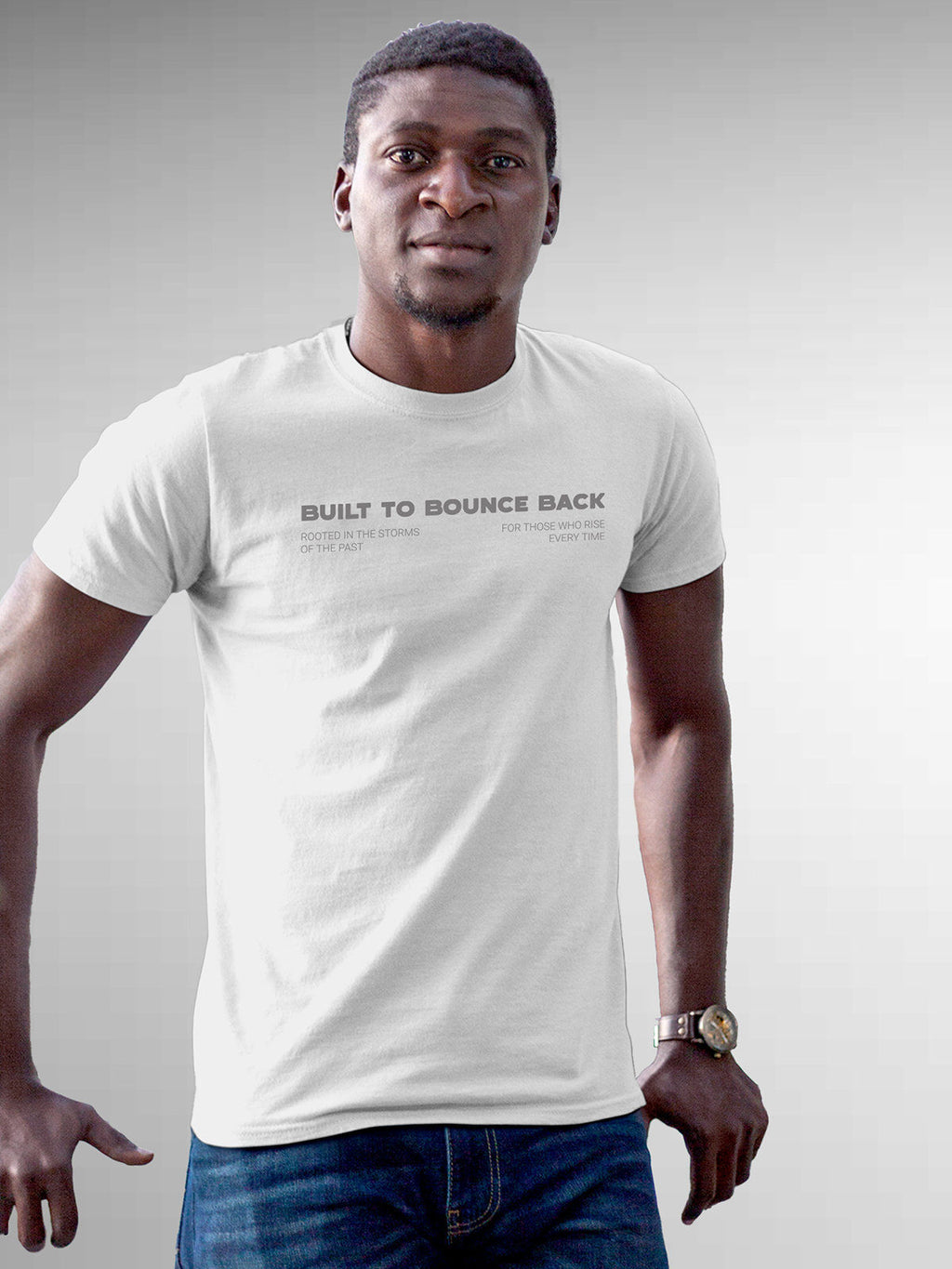 Model wearing Men's White Round Neck T-shirt with 'Built To Bounce Back' design, offering effortless style and premium comfort