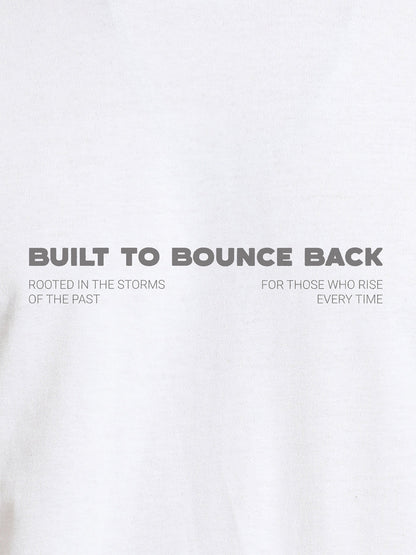 Close up of 'Built To Bounce Back' design on Men's White Round Neck T-shirt, highlighting intricate details and vibrant print.